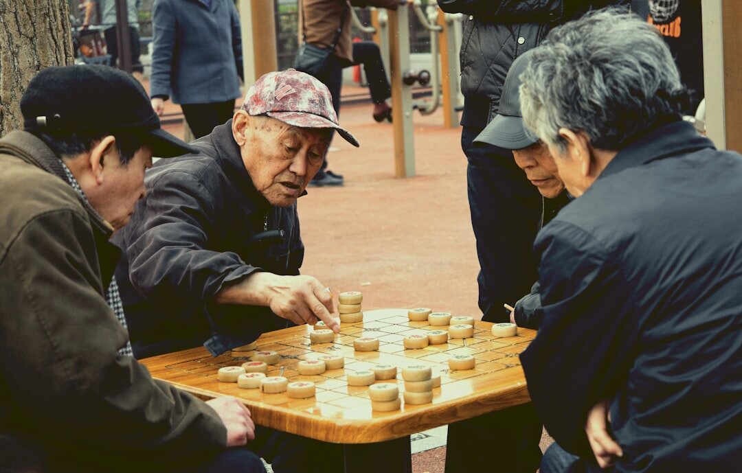 elderly group playing board games